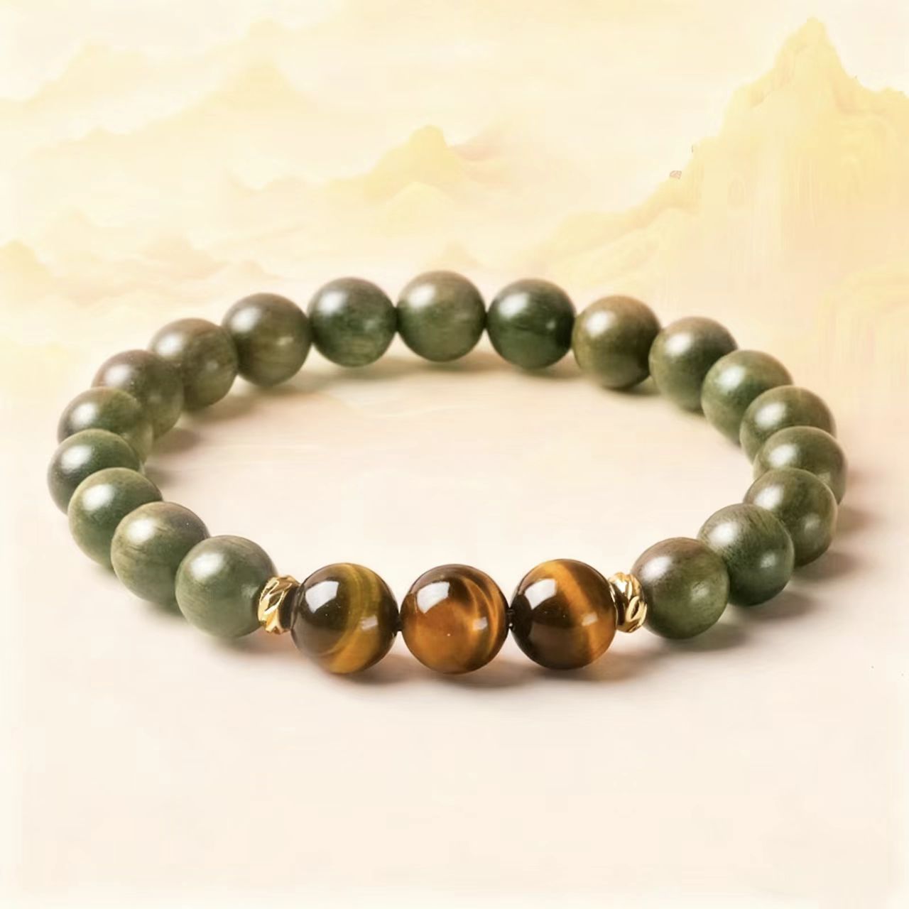 Beaded bracelet with green and brown beads on a beige background