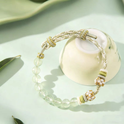 Bracelet with beads on a light surface
