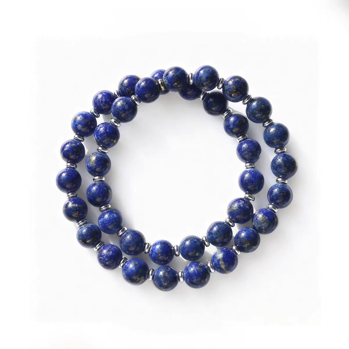 Two blue beaded bracelets on a white background