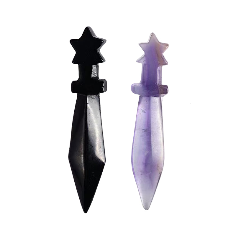 Black and purple dagger on a white background