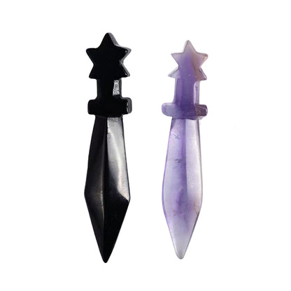 Black and purple dagger on a white background